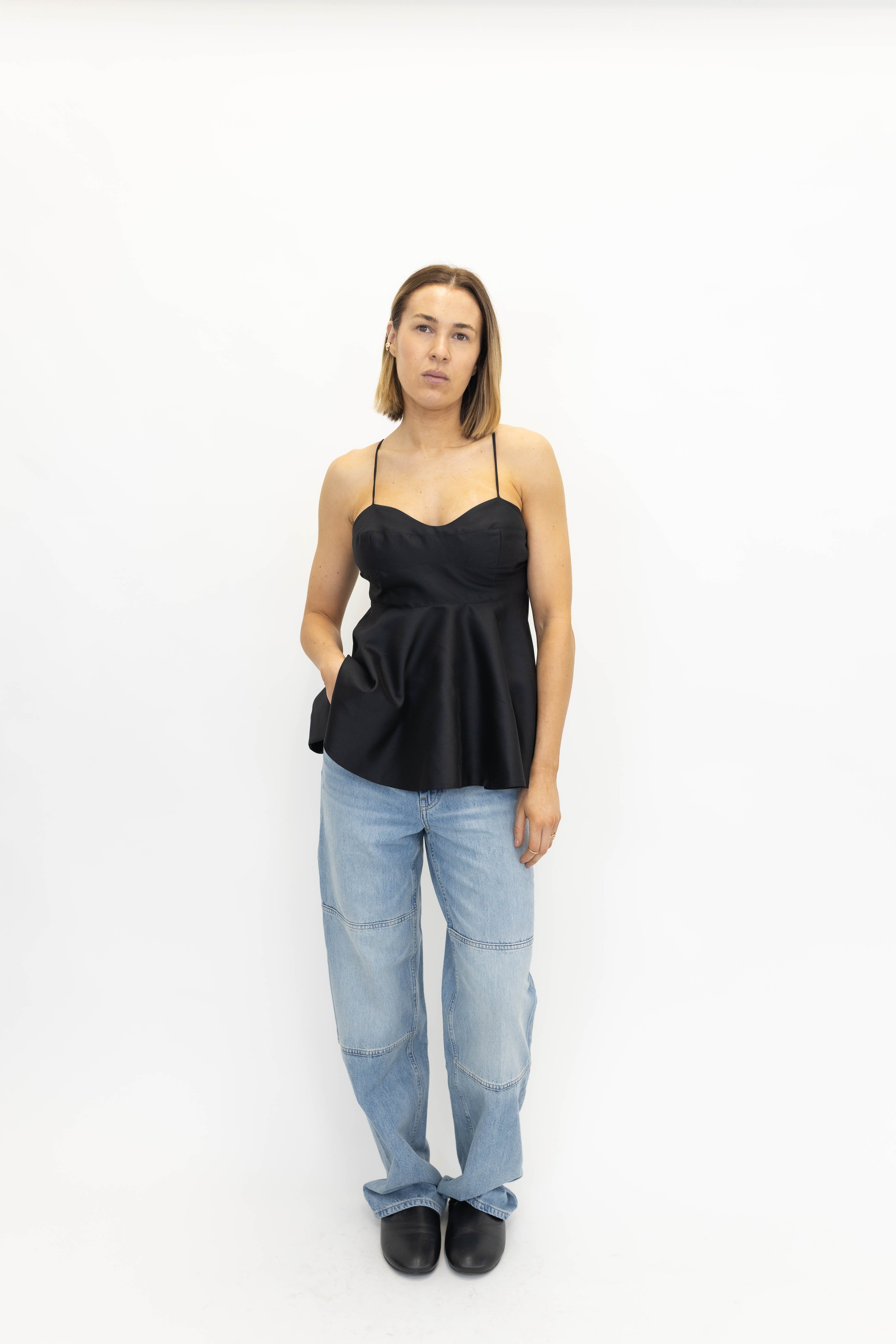 BUSTIER PEPLUM TOP IN BLACK TOP ROHE