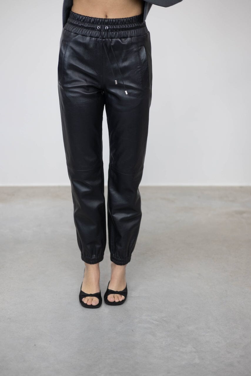 JUSTICE ELASTIC WAISTBAND LEATHER PANTS PANTS STAND STUDIO 