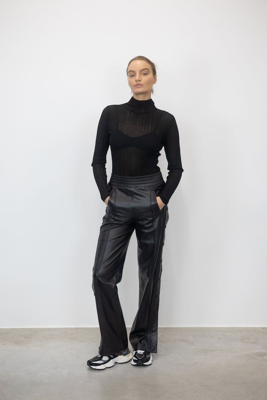 POPPER RELAXED FIT LEATHER PANTS WITH SIDE BUTTONS PANTS STAND STUDIO 