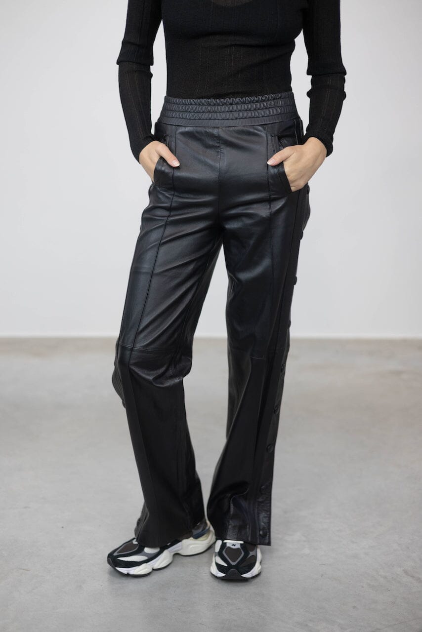 POPPER RELAXED FIT LEATHER PANTS WITH SIDE BUTTONS PANTS STAND STUDIO 