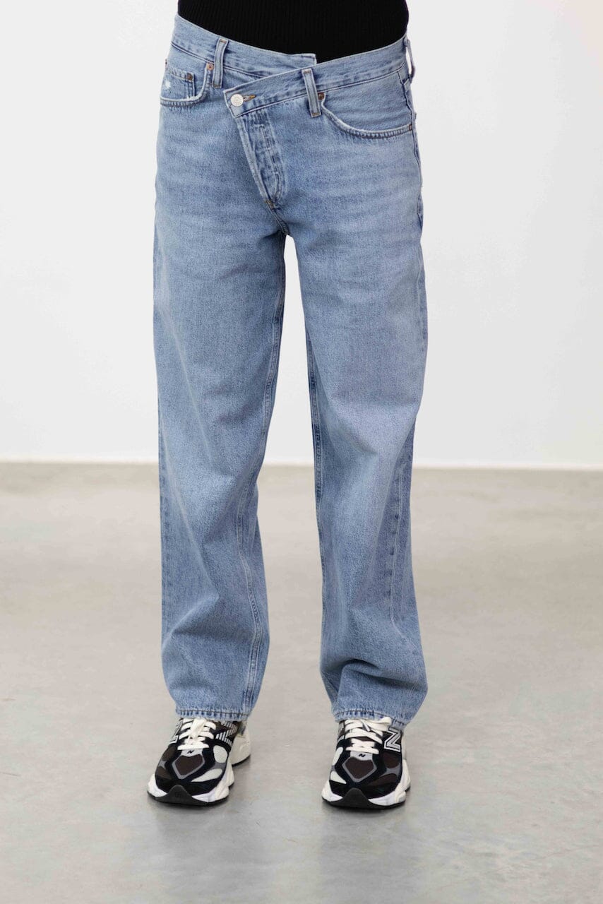 THE ICONIC ASYMETRIC JEANS IN ETERNAL JEANS AGOLDE 