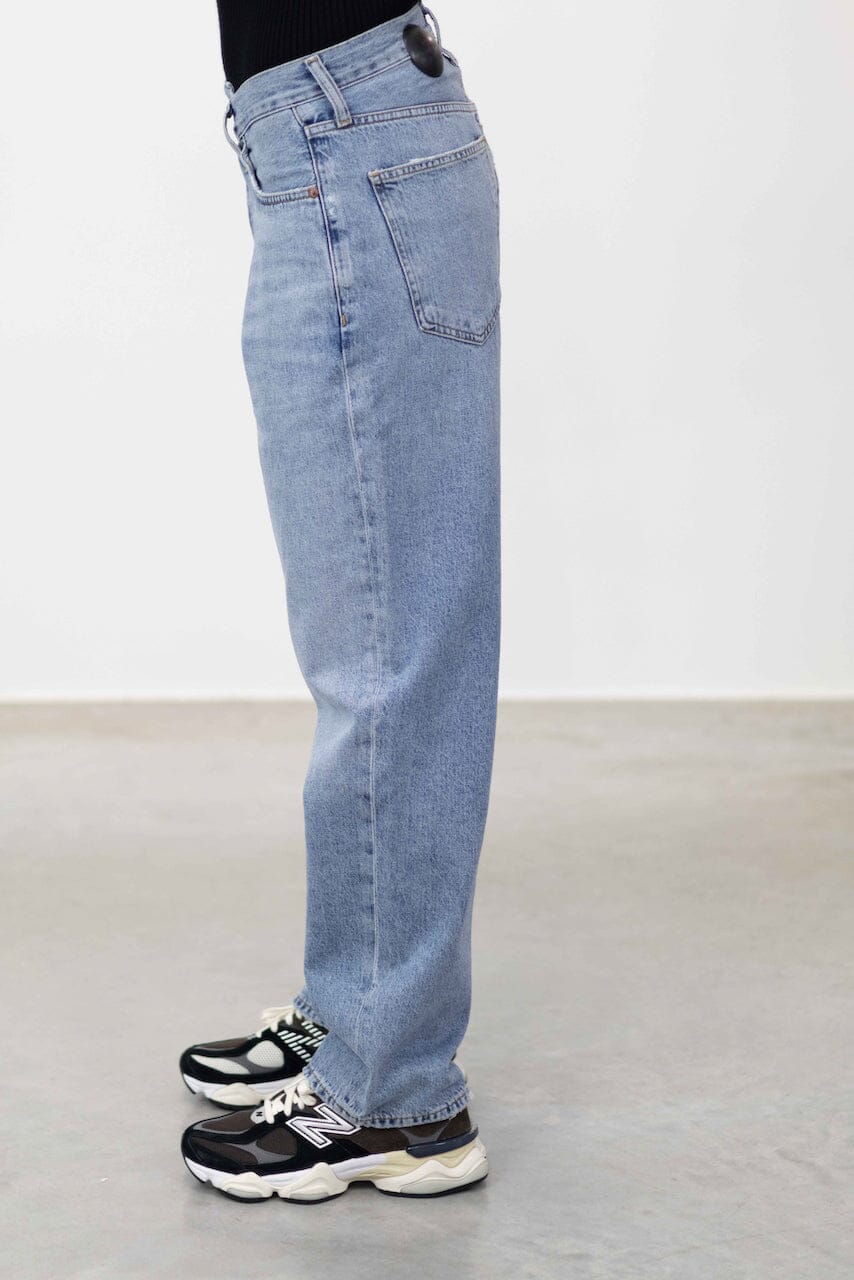 THE ICONIC ASYMETRIC JEANS IN ETERNAL JEANS AGOLDE 