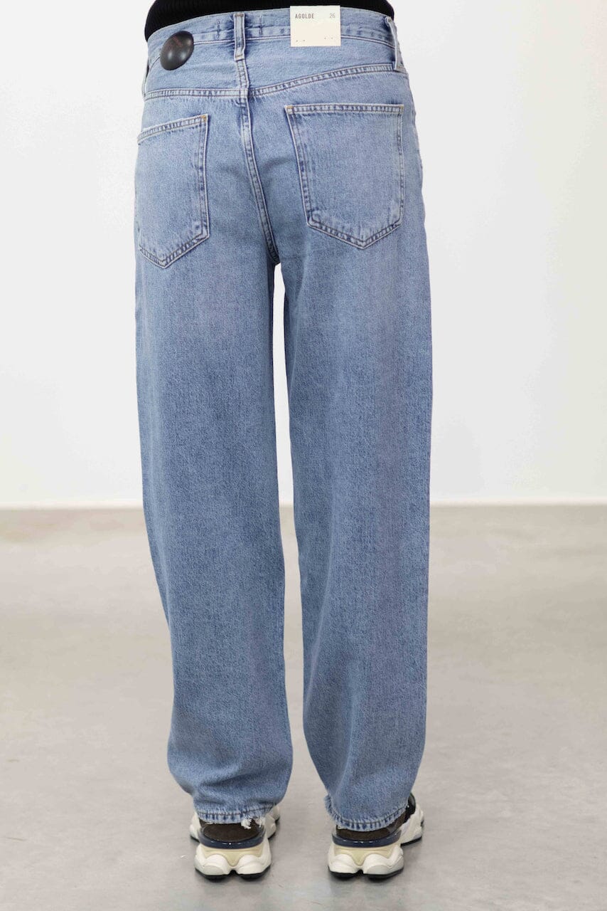 THE ICONIC ASYMETRIC JEANS IN ETERNAL JEANS AGOLDE 