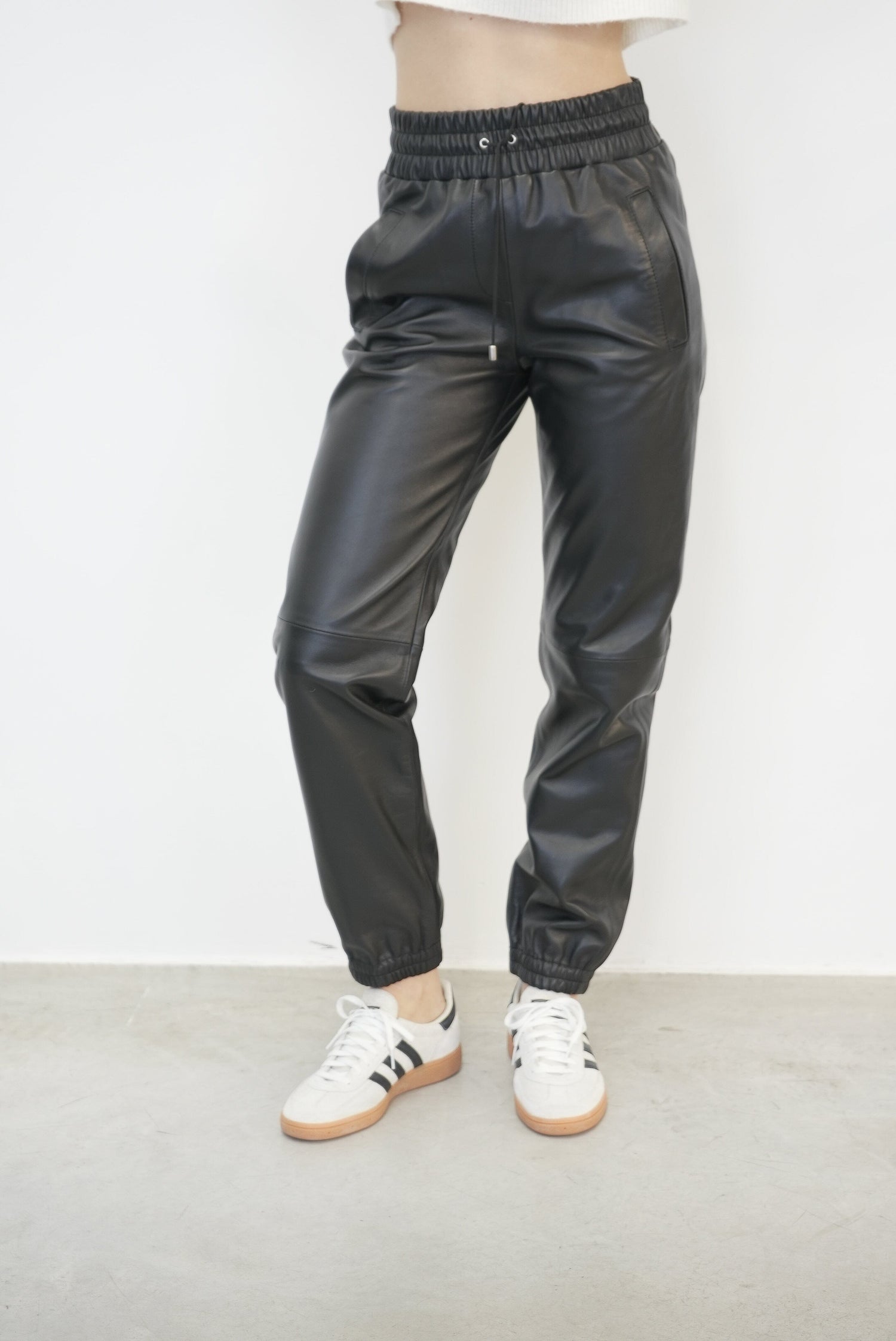 JUSTICE ELASTIC WAISTBAND LEATHER PANTS PANTS STAND STUDIO 