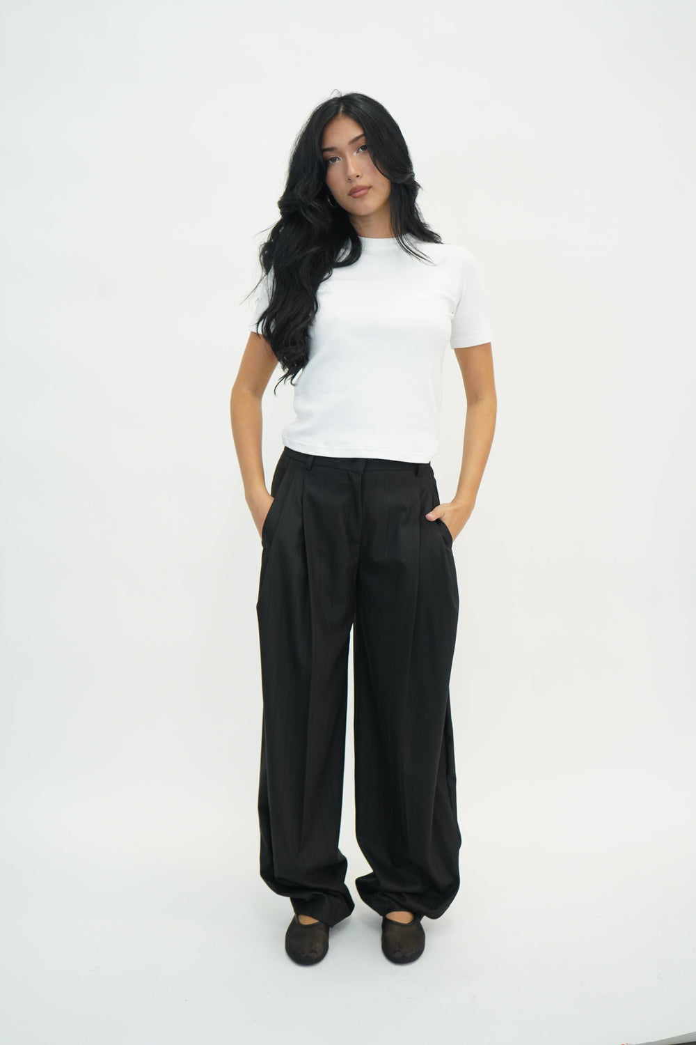 TRACY PINSTRIPED PANTS IN BLACK PANTS THE ANDAMANE 