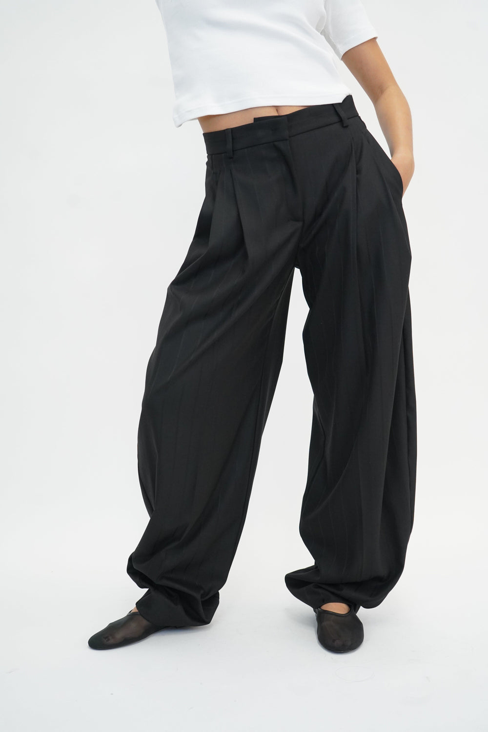 TRACY PINSTRIPED PANTS IN BLACK PANTS THE ANDAMANE 