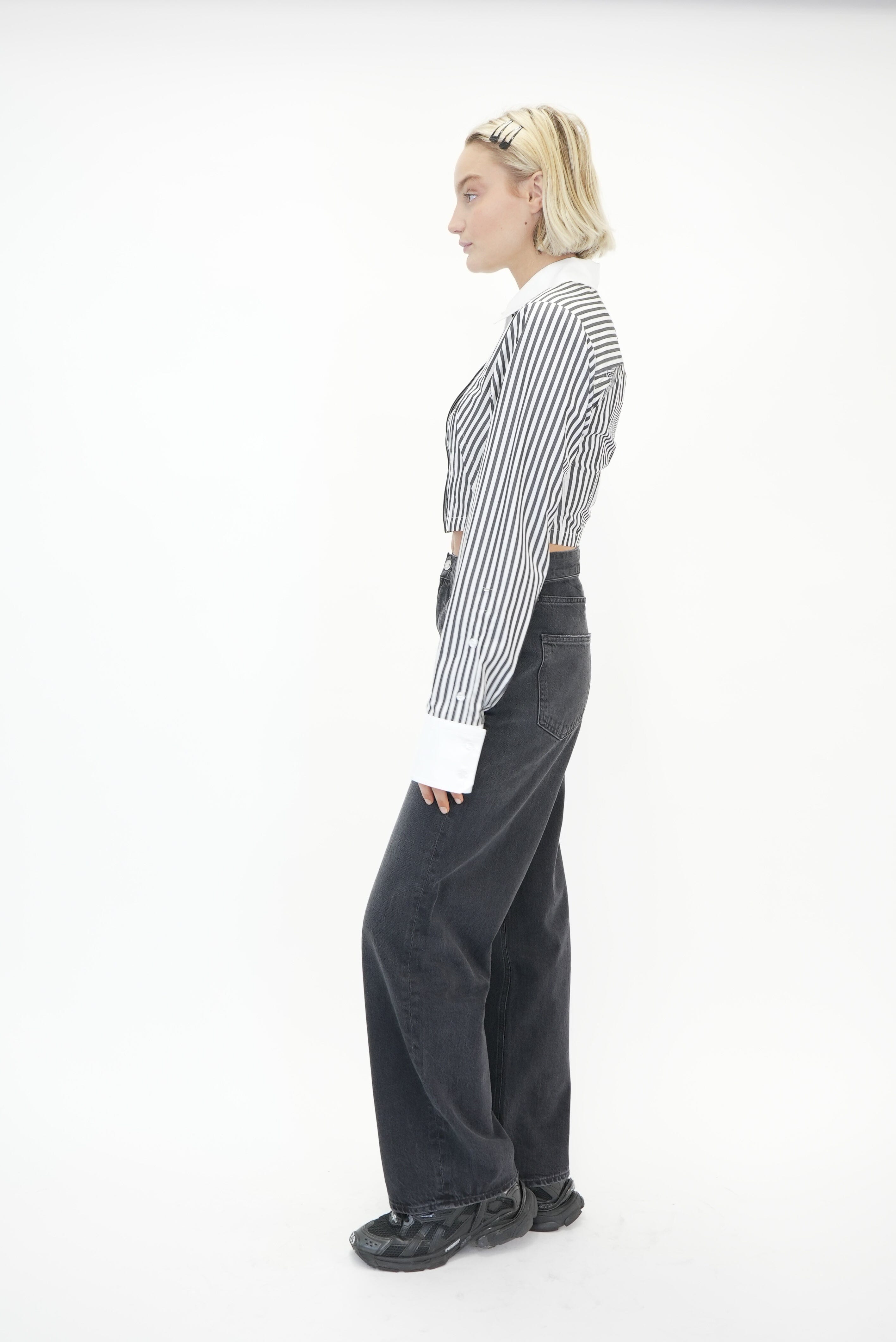 LOW CURVE JEAN IN BLACK TAR JEAN AGOLDE 