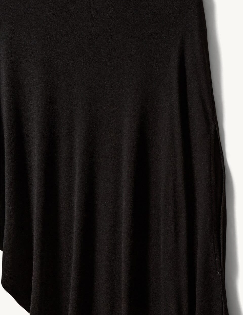 BREANNA ASYMMETRIC TOP IN BLACK TOP THE GARMENT 