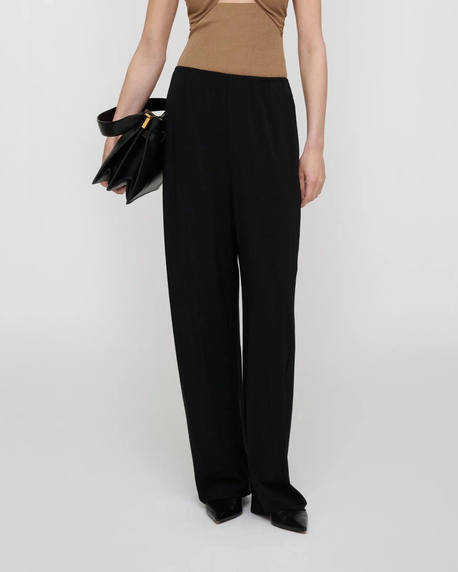 ZOELA FLUID JERSEY PANTS IN BLACK PANTS NANUSHKA 