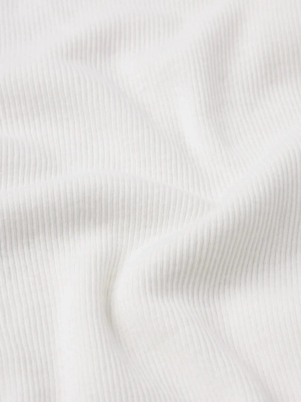 THE GHOST TANK IN CREAM TANK TOP FRAME 