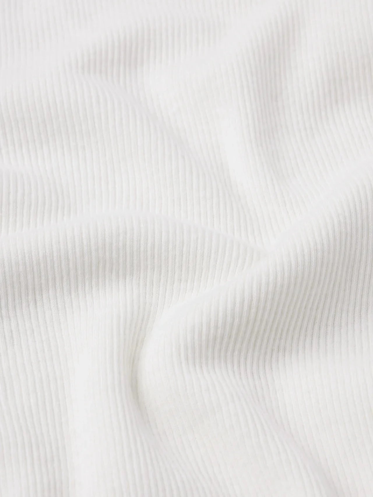 THE GHOST TANK IN CREAM TANK TOP FRAME 