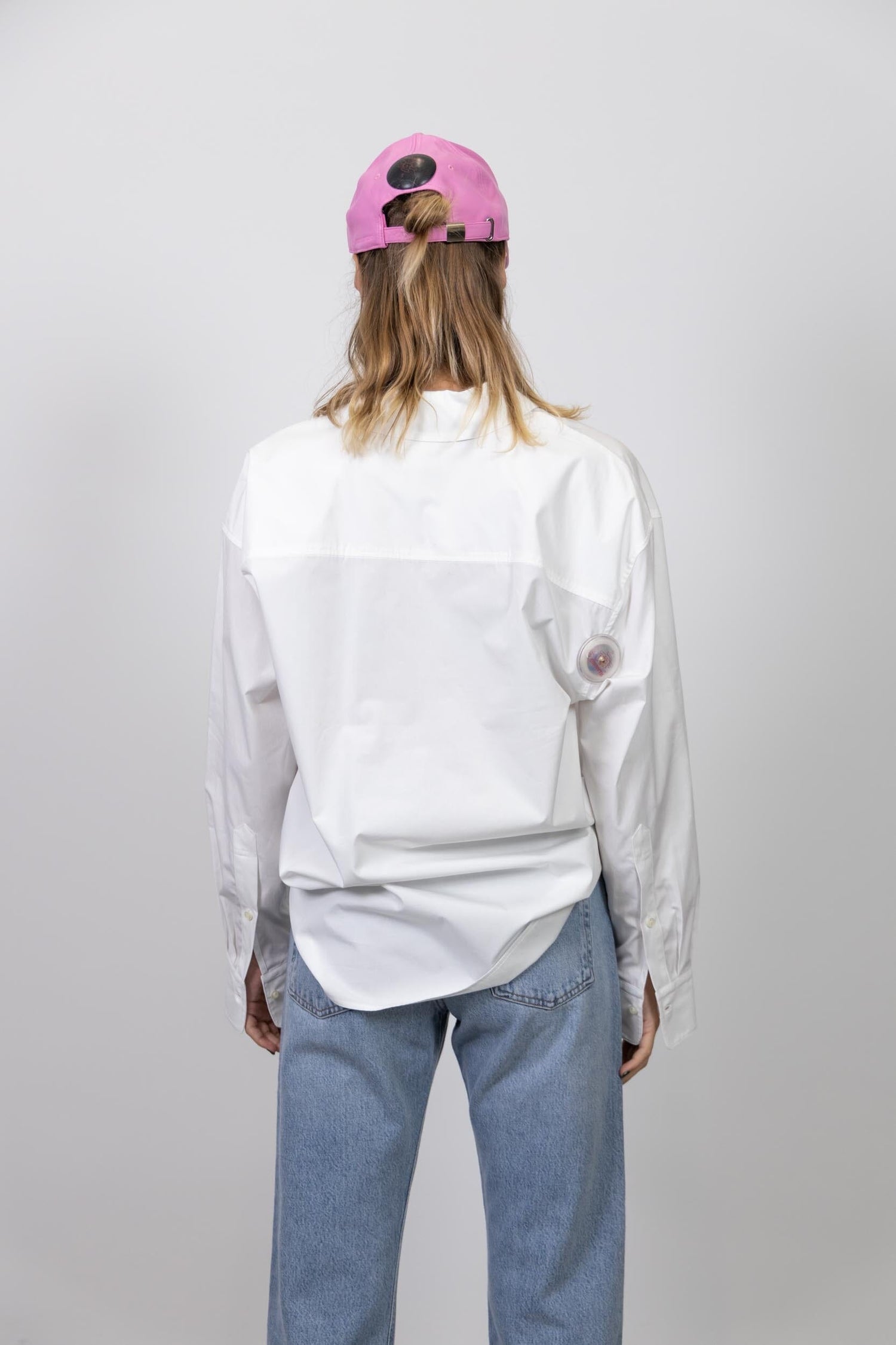 CONNIE FAUX LEATHER CAP IN PINK CAP STAND STUDIO 